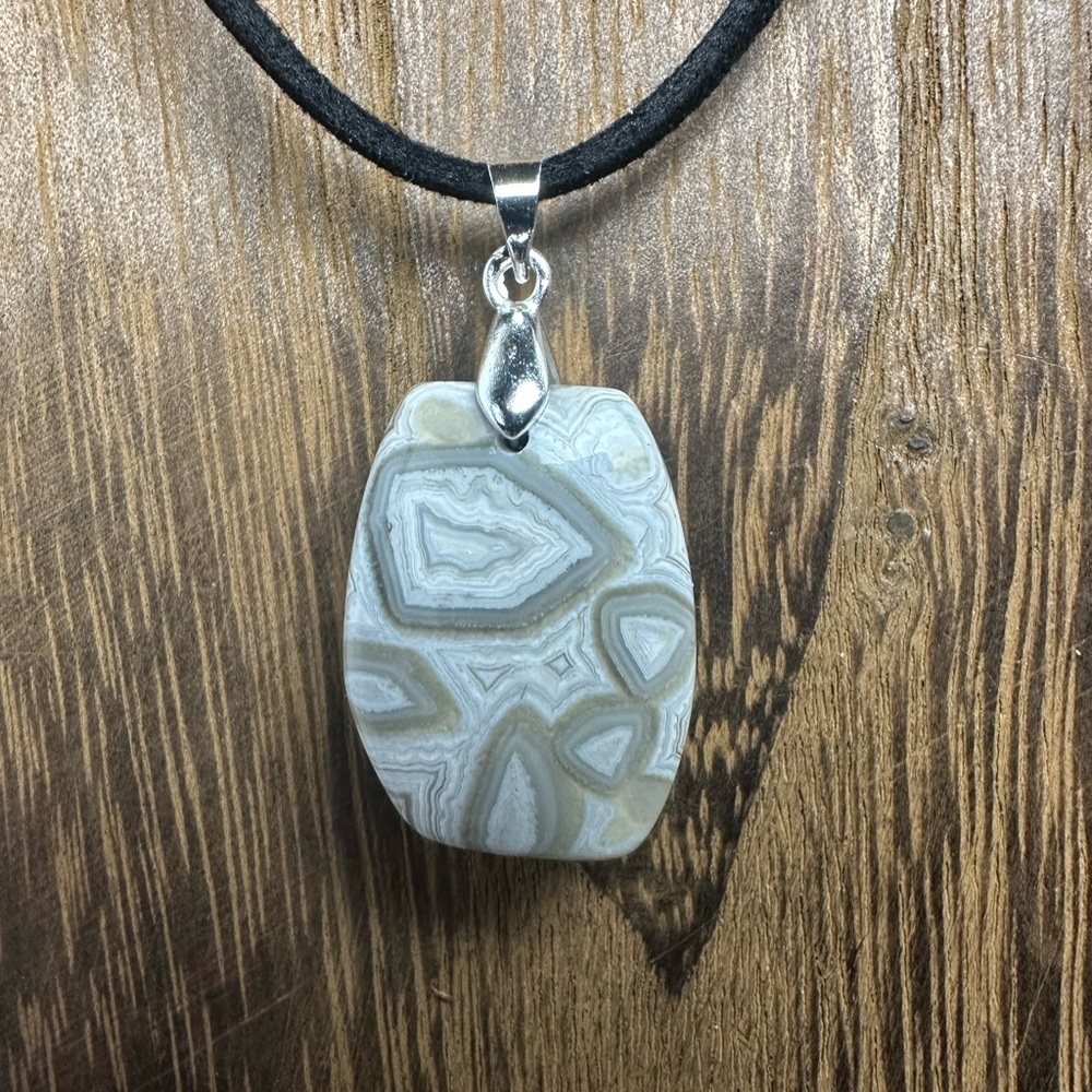 Mexican Crazy Lace Agate Pendant Necklace on Black Faux Suede